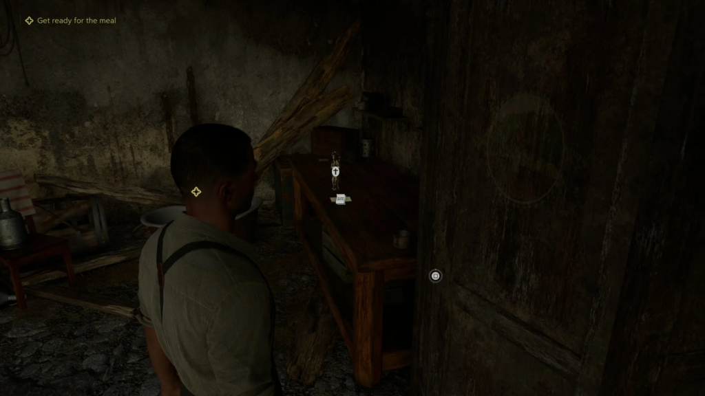 Man examines wooden shelf in dark room