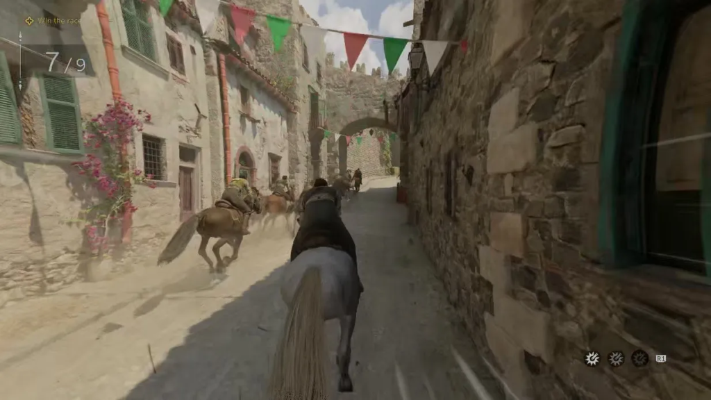 Horse rider racing through stone village street with flags