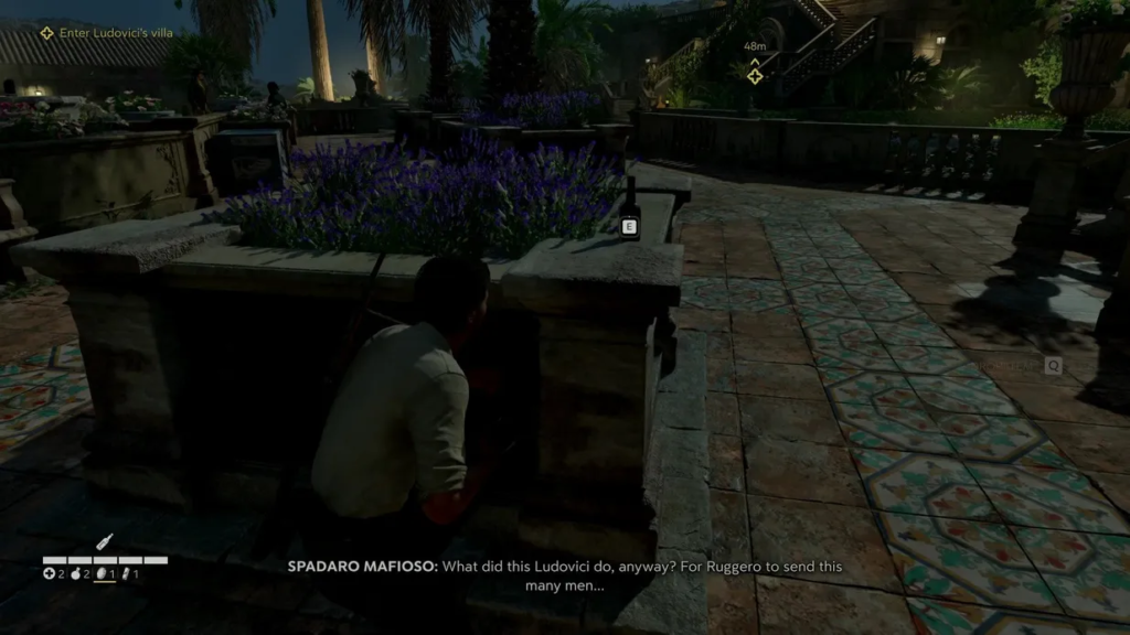 Mafia III protagonist crouching behind planter in villa courtyard