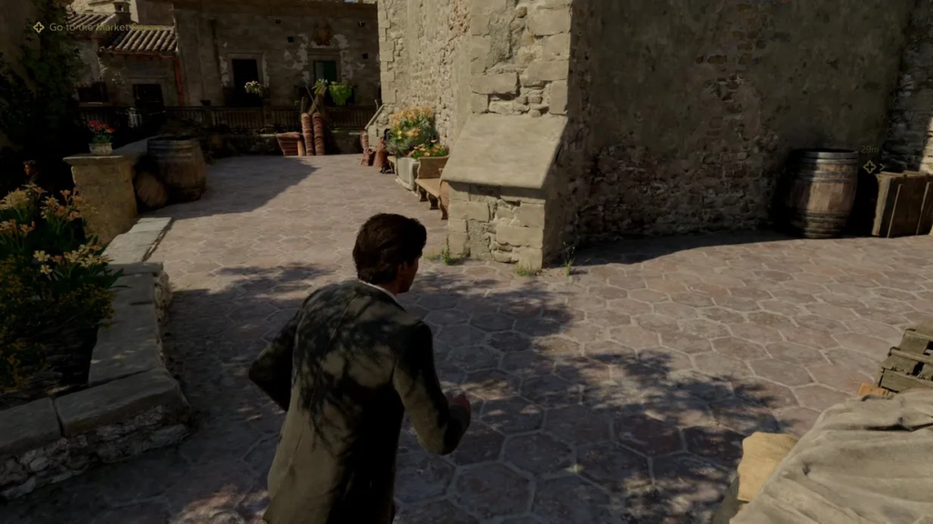 Nathan Drake running through stone courtyard in Uncharted 4