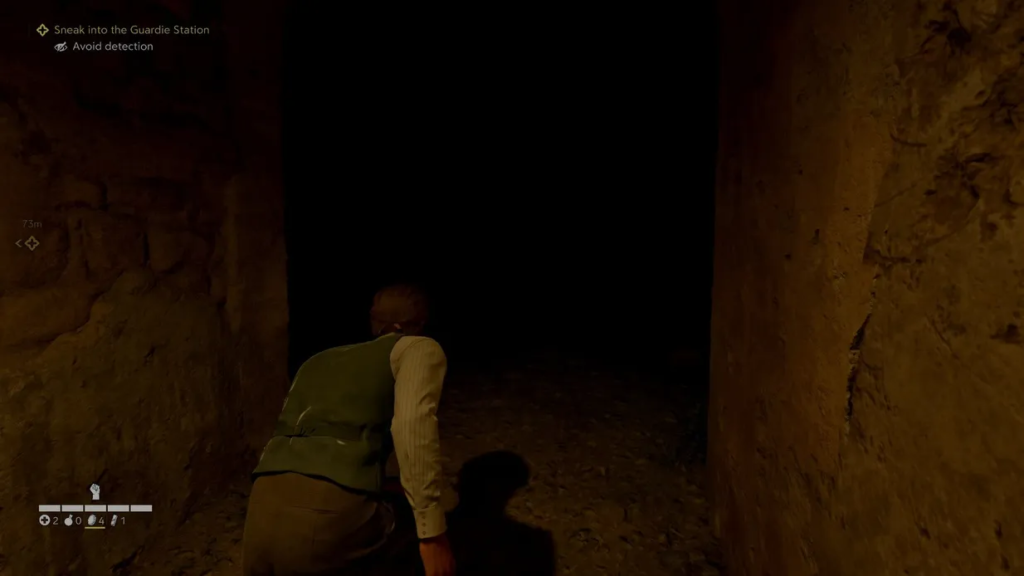 Crouching man sneaks through dark tunnel in game