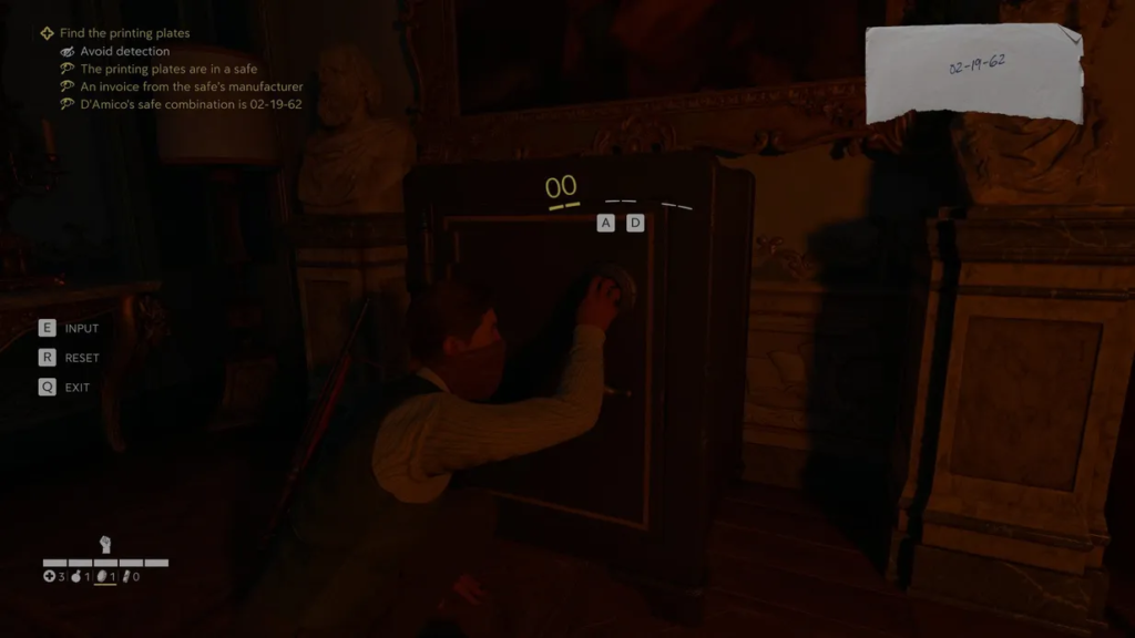 Man turning safe dial in dim room