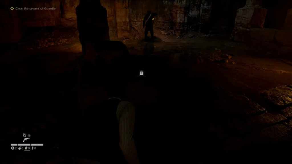 Player character crouches in dark sewer tunnel behind enemy