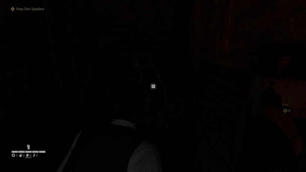 Player holding cat in dark room in Mafia III