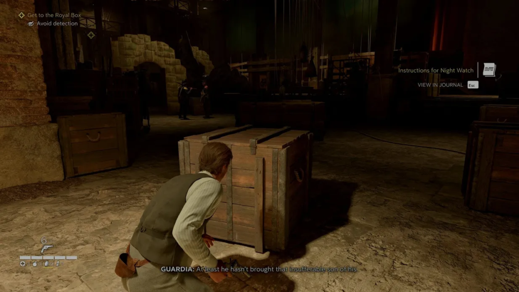 Karl Fairburne crouching behind wooden crate in warehouse