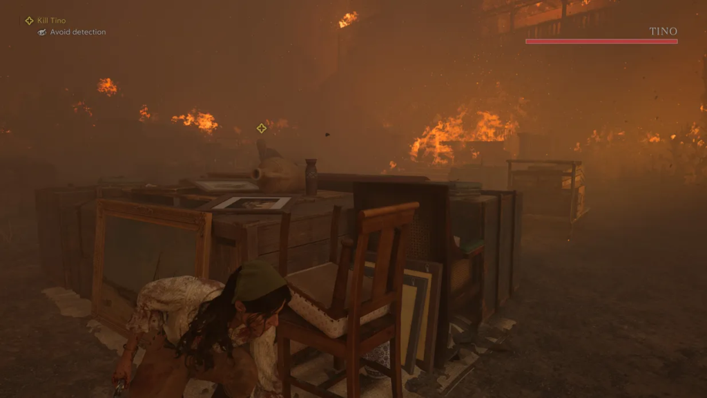 Player crouching behind crates in burning warehouse level