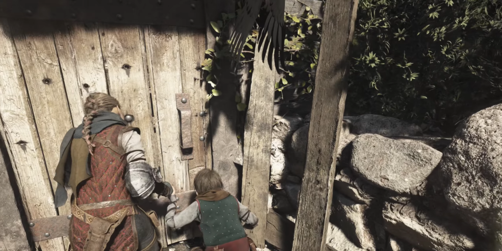 Amicia and Hugo open wooden door by rocks