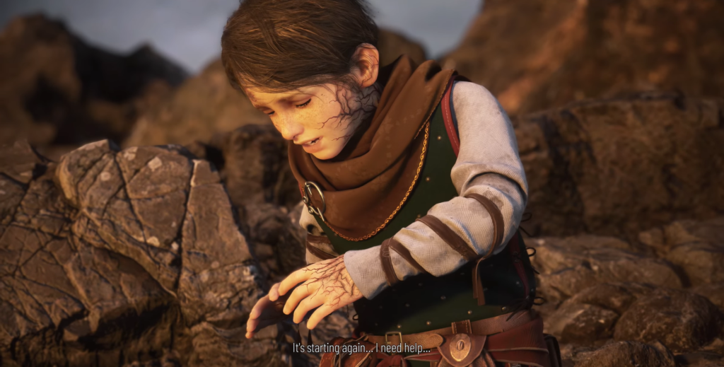 Amicia de Rune holds arm on rocky shore