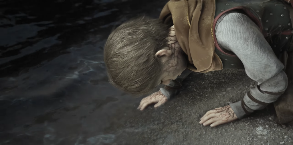 Boy kneeling on rocky shore beside dark water