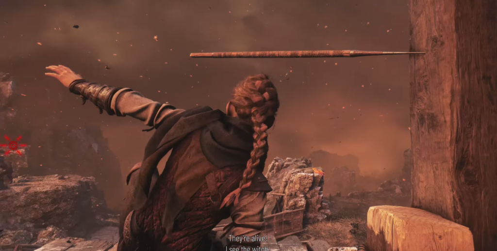 Amicia throws spear near wooden wall in smoky ruins