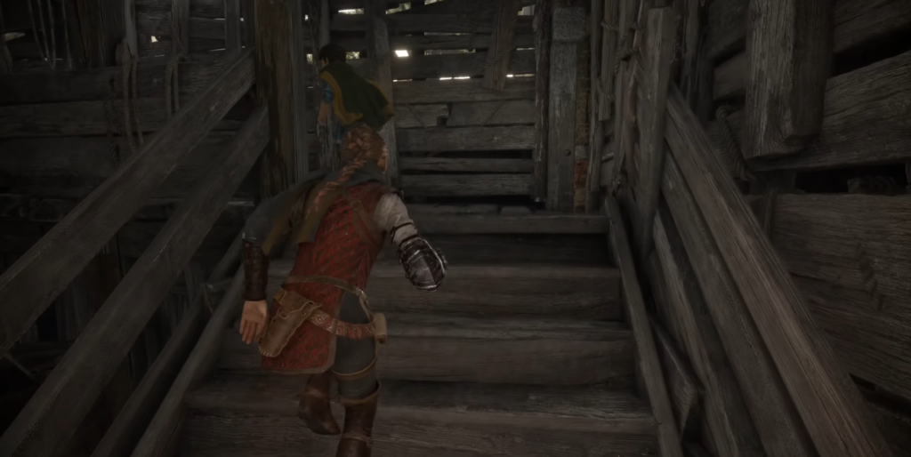 Amicia de Rune climbs wooden stairs in A Plague Tale