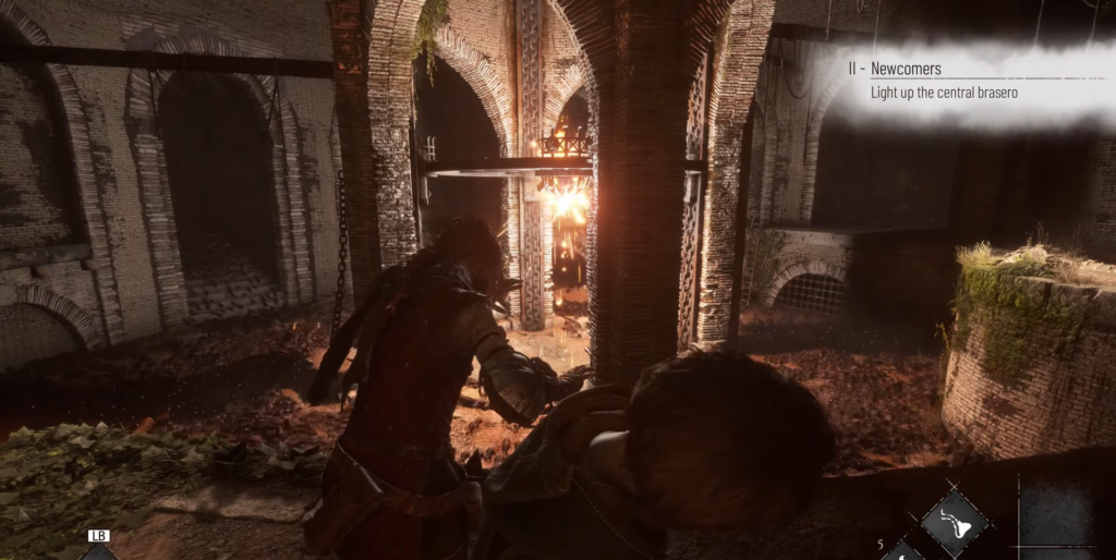 Player character lighting brazier in brick ruin corridor