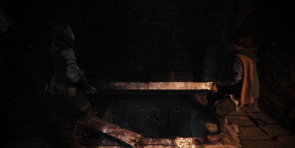 Two people look into a dark pit indoors