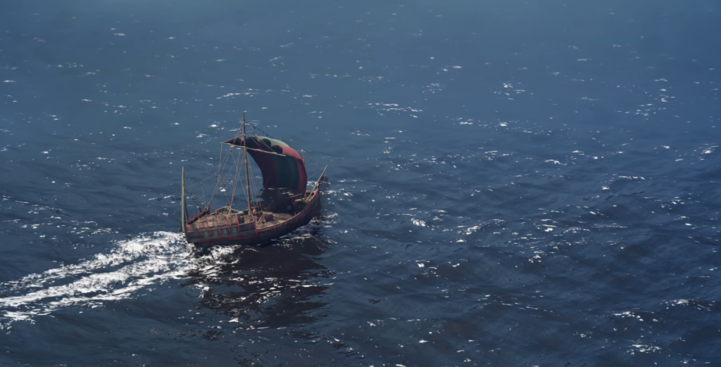 Viking ship sailing on open blue sea.