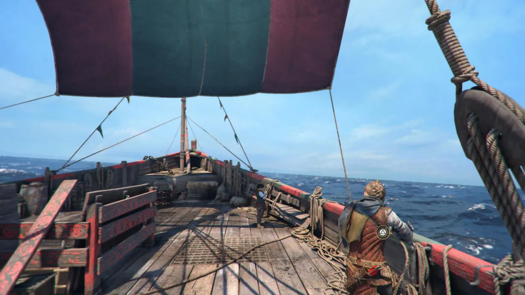 Viking ship sailing on open sea, clear sky.