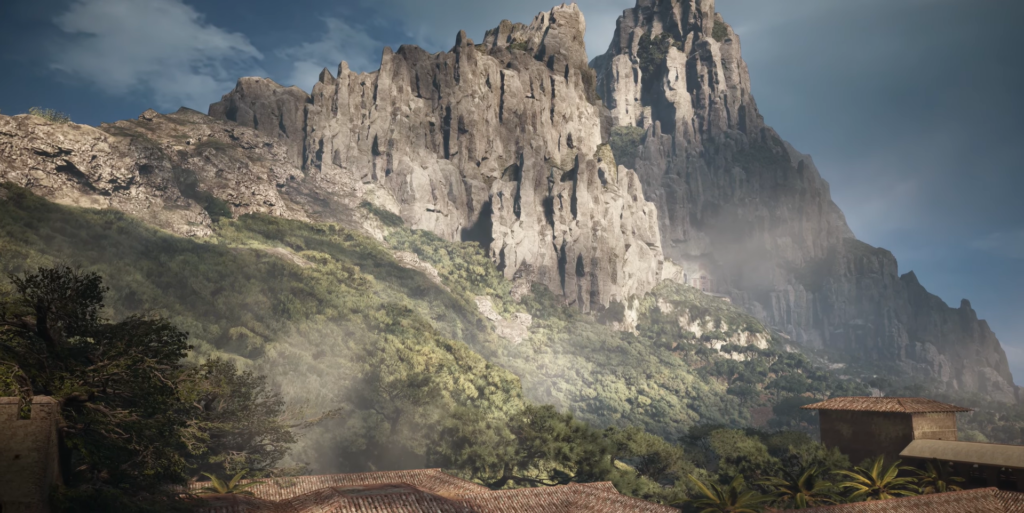 Majestic mountains loom over a lush valley.