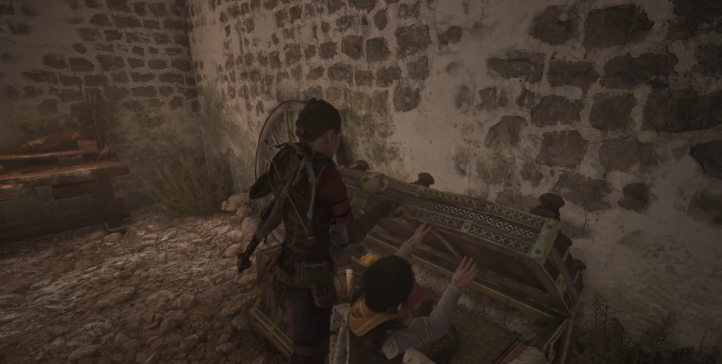 Characters explore a chest in A Plague Tale.