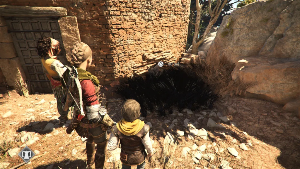 Amicia and Hugo examining a dark mass in A Plague Tale.