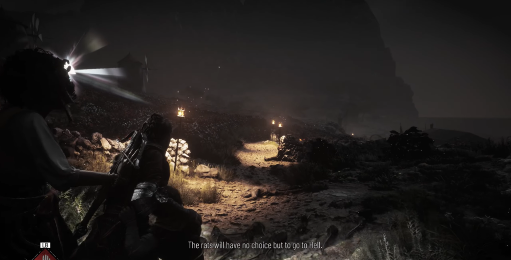 Characters prepare to navigate a dark, rocky path.