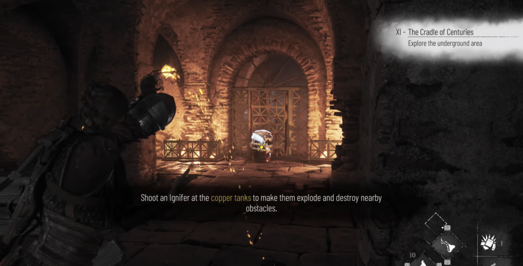 Lara Croft shoots igniter at copper tanks.