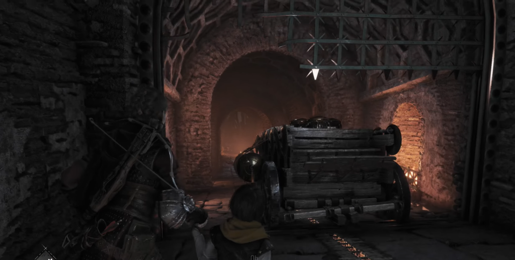 Character pushes a cart in dark tunnel.