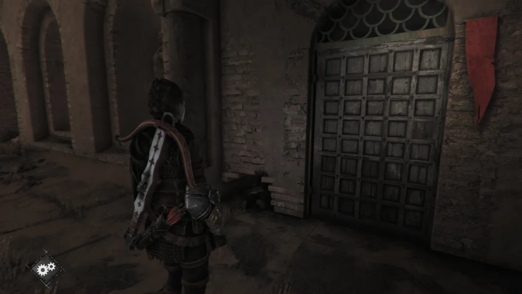 Character standing near a wooden door.