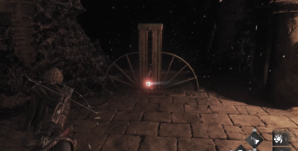 Character aiming at glowing target in dark setting.