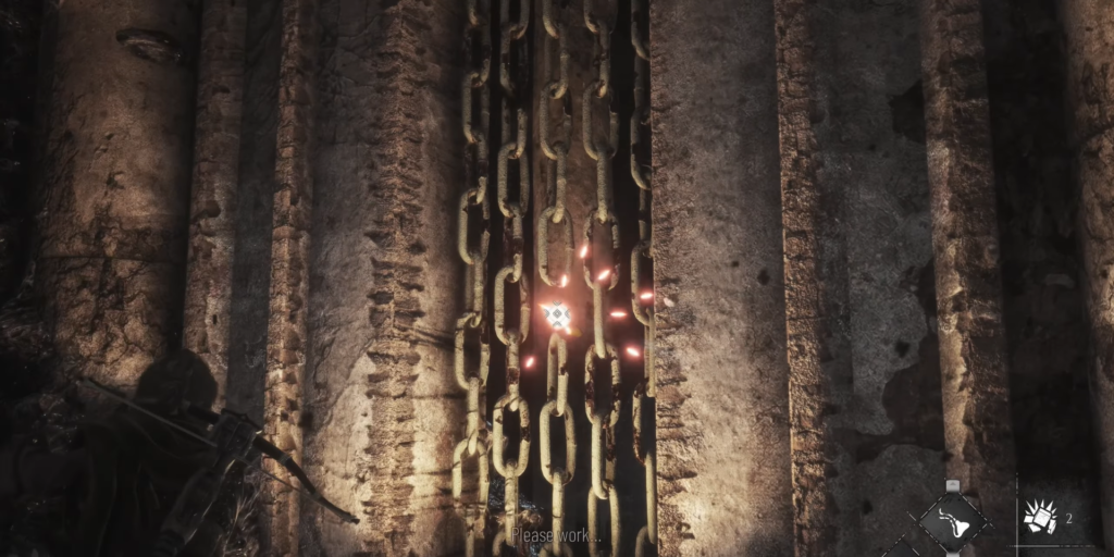Chains glowing against a textured stone wall.