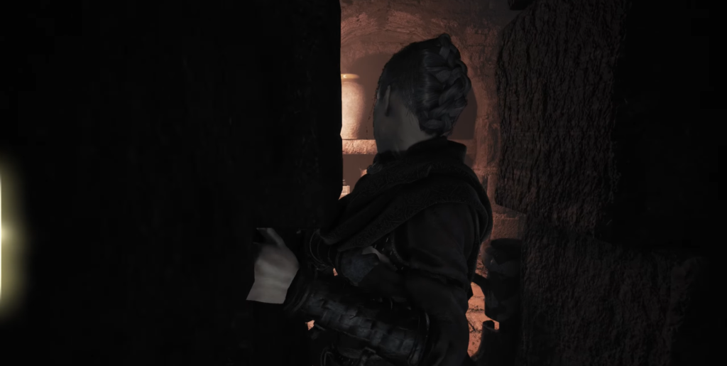 Amicia A Plague Tale: Requiem opening door cautiously.