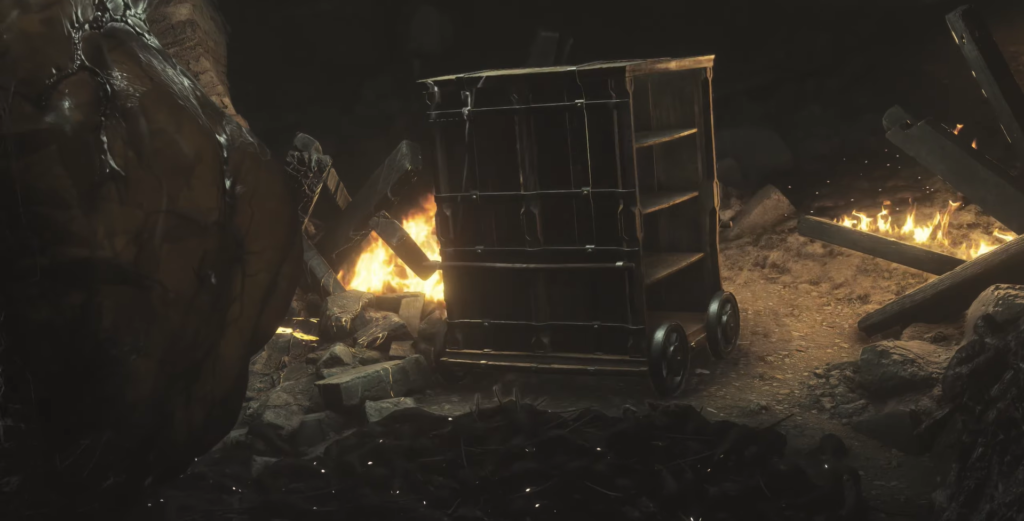 A shadowy cavern illuminated by flickering flames.