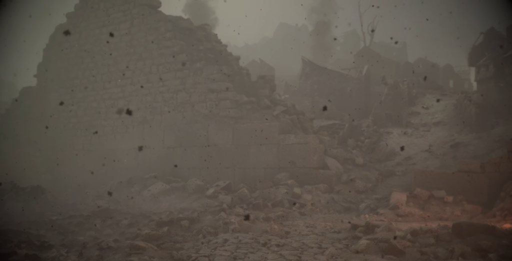 Ruined stone wall amidst dusty debris.