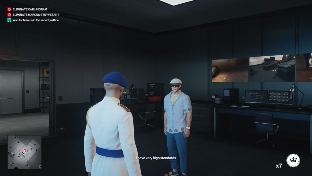 Hitman Agent 47 talks to man in security office