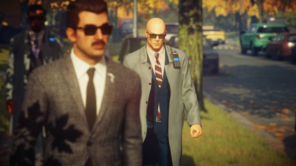 Agent 47 from Hitman walking on street sidewalk