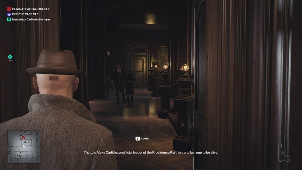 Agent 47 watches Alexa Carlisle in mansion hallway