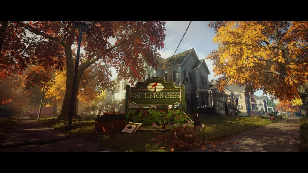Whittleton Creek welcome sign in suburban street autumn trees