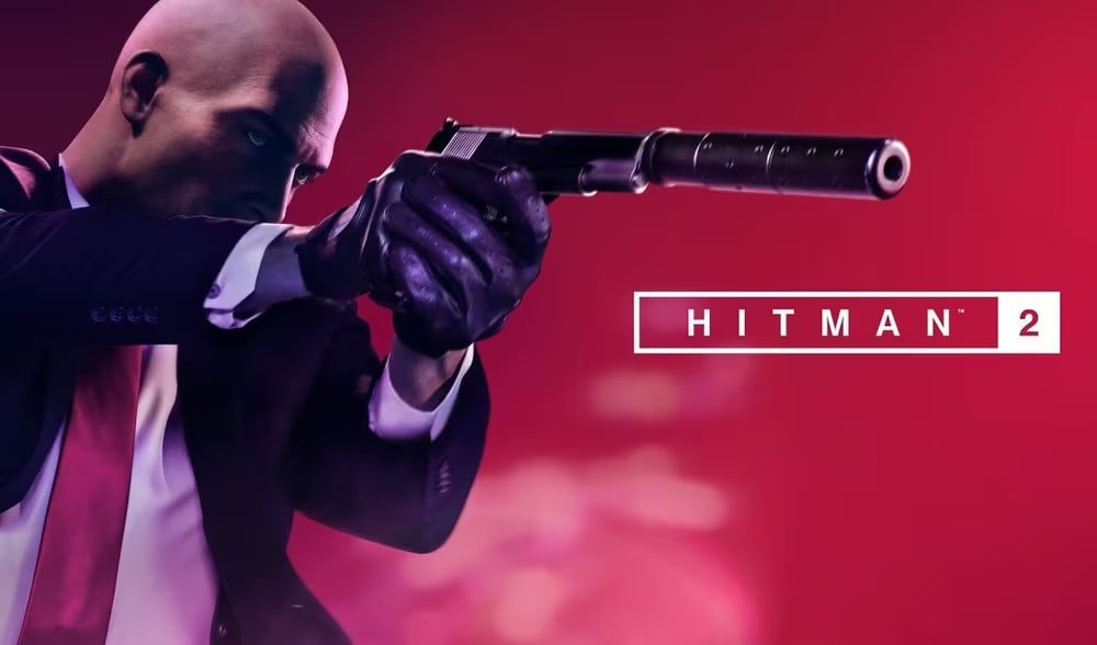 Agent 47 aims silenced pistol in Hitman 2