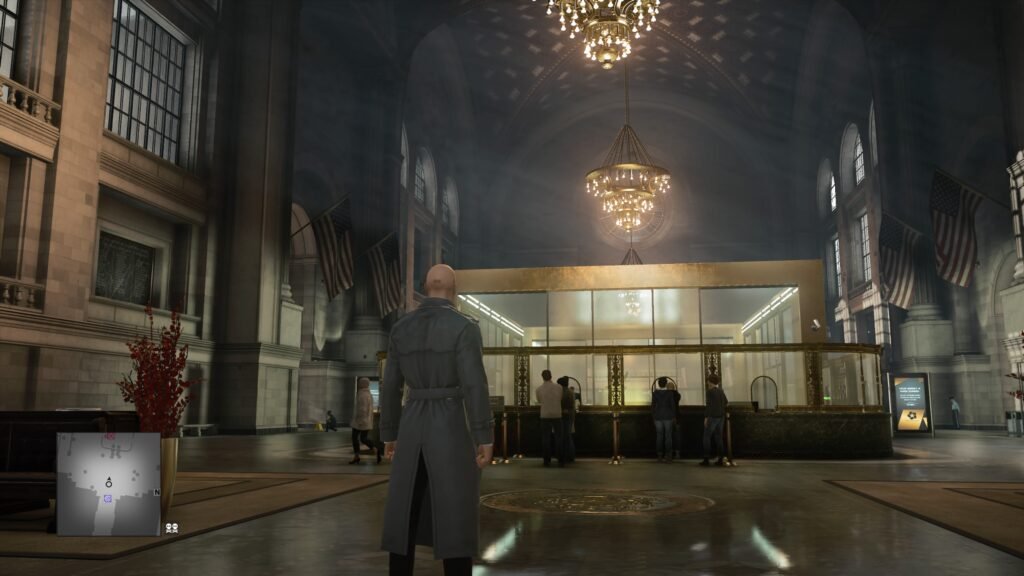 Agent 47 stands in bank lobby in Hitman