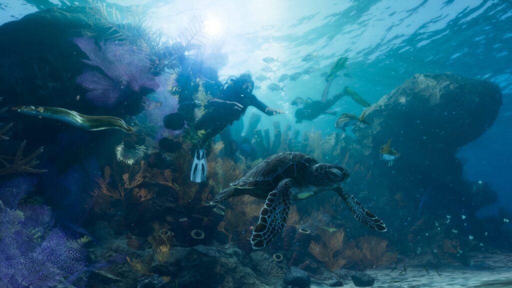 Scuba divers swim above sea turtle on coral reef