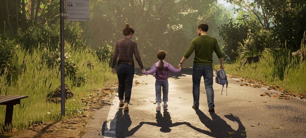 Family holding hands walking on forest road