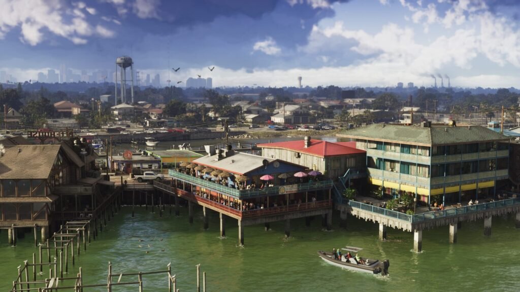 Boat passing waterfront buildings on green water under clouds
