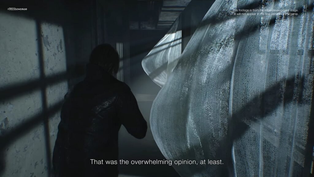 Man in dark jacket approaches translucent fabric.