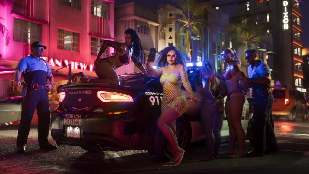 Women posing on police car at neon street night